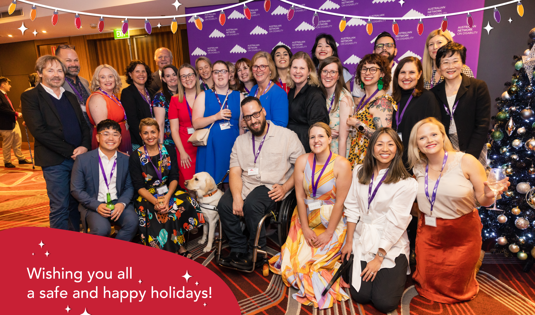 Australian Network on Disability team smiling with text 'Wishing you all a safe and happy holidays!'